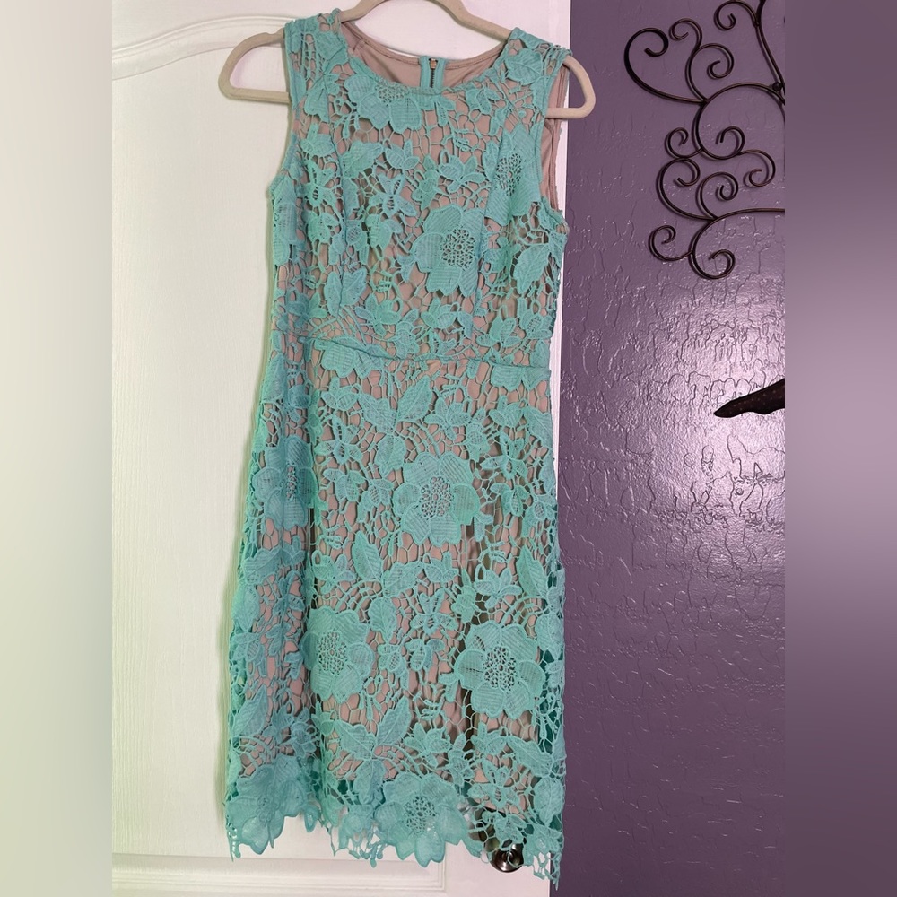 Woman’s teal Lace overlay dress